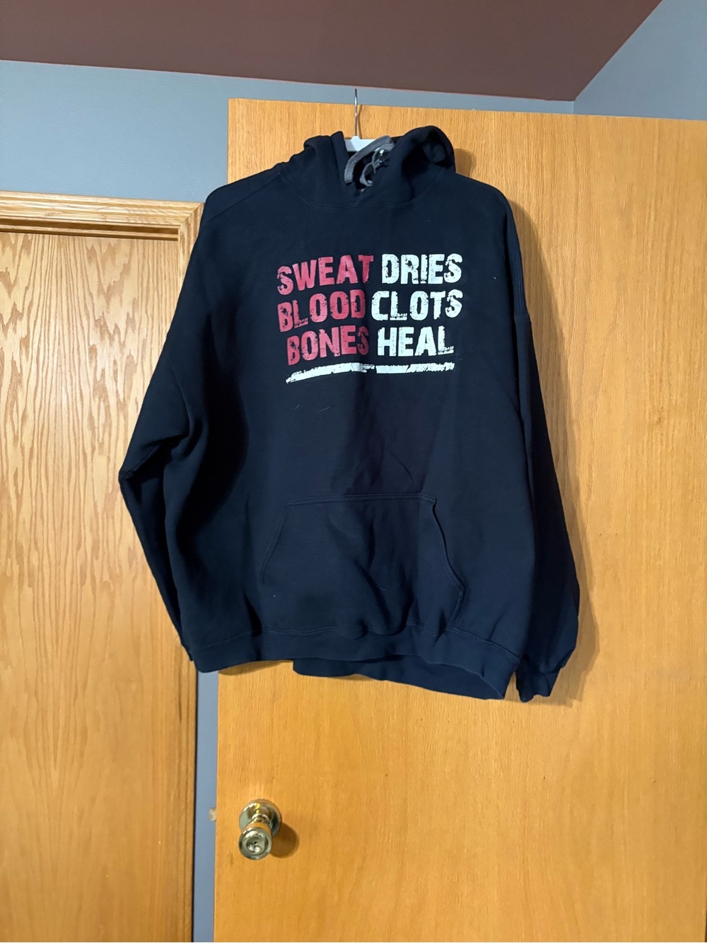 Grunt Style Black Hoodie with Red and White Graphic Text